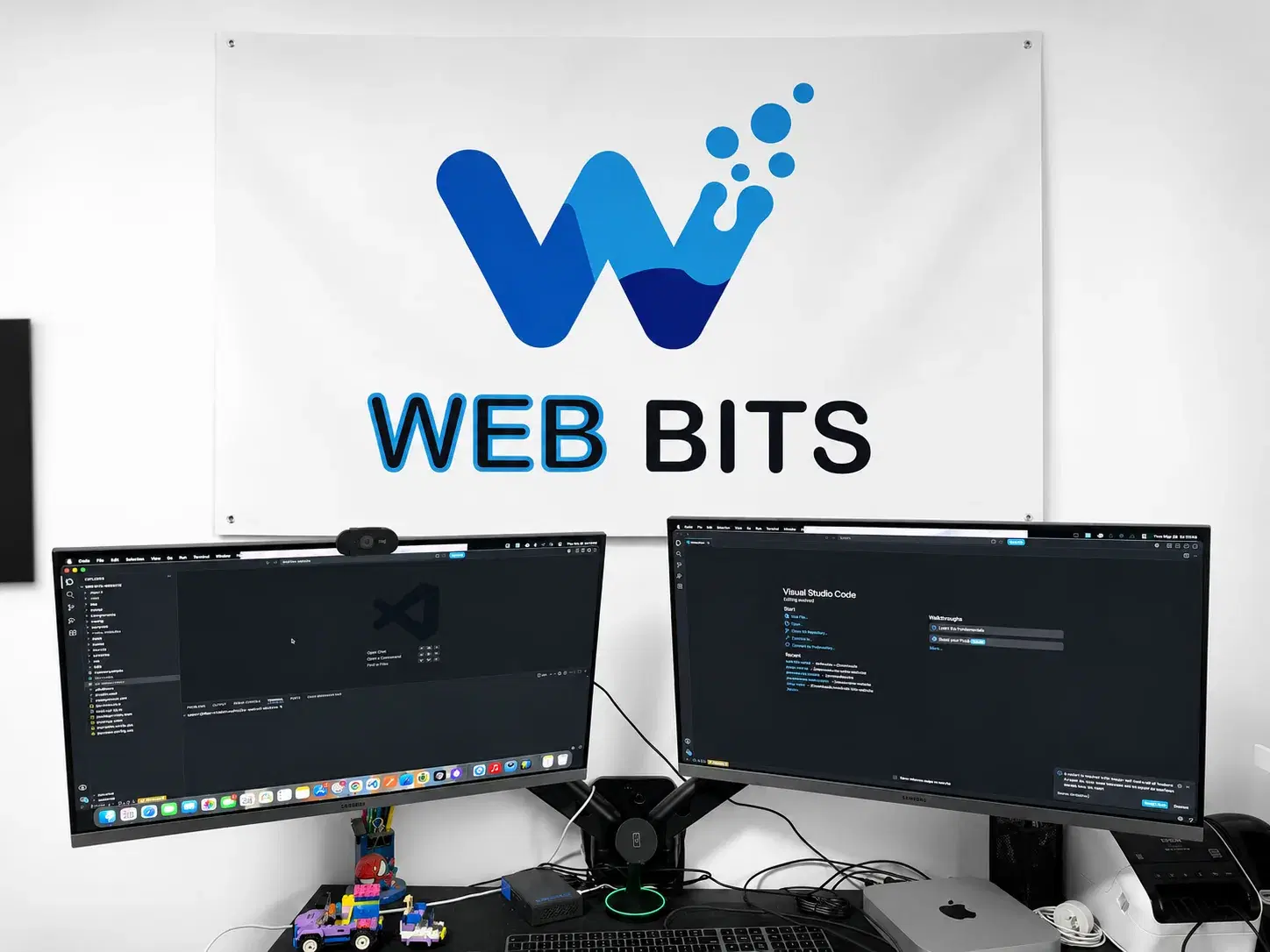 WebBits office with logo sign and development workspace